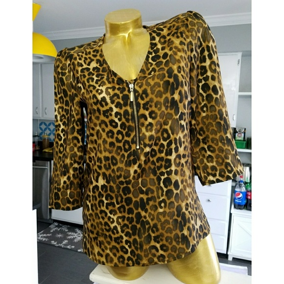 Express Tops - Express leopard print half zip blouse